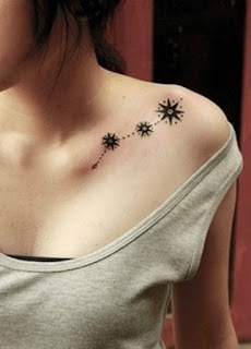 Beautiful three star tattoo design on shoulder above chest