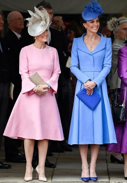 Kate Middleton wore a sky blue coat by Emilia Wickstead. The Countess of Wessex wore a baby pink bell-sleeve wool and silk blend dress
