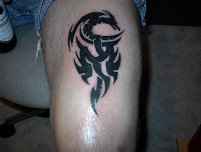 tribal tattoo , dragon tattoo