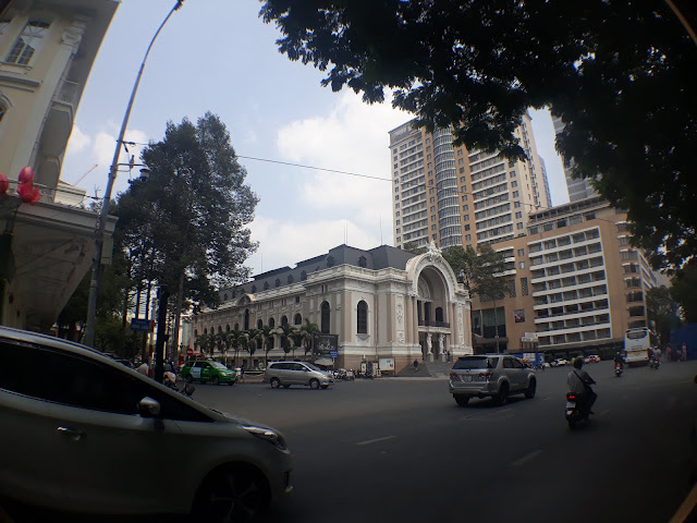 The Saigon Opera House stands out in the midst of modern buildings