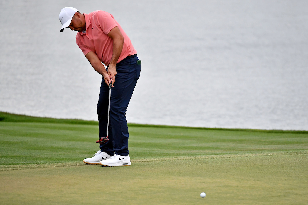 Jason Day putts