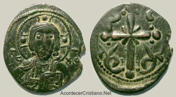 Moneda antigua con la imagen de Jesús
