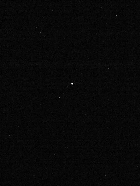 Earth and Moon seen by OSIRIS-REx spacecraft from 63 million kilometers away
