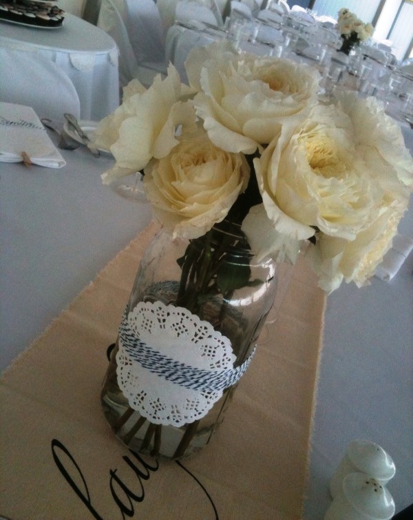 Jane 39s wedding centerpiece vintage jar adored with lace paper doily and