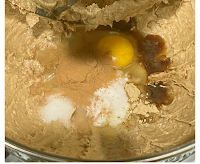 after creaming the butter and raisin puree, eggs, salt, baking soda, ginger, cinnamon, and vanilla are added to the mixing bowl