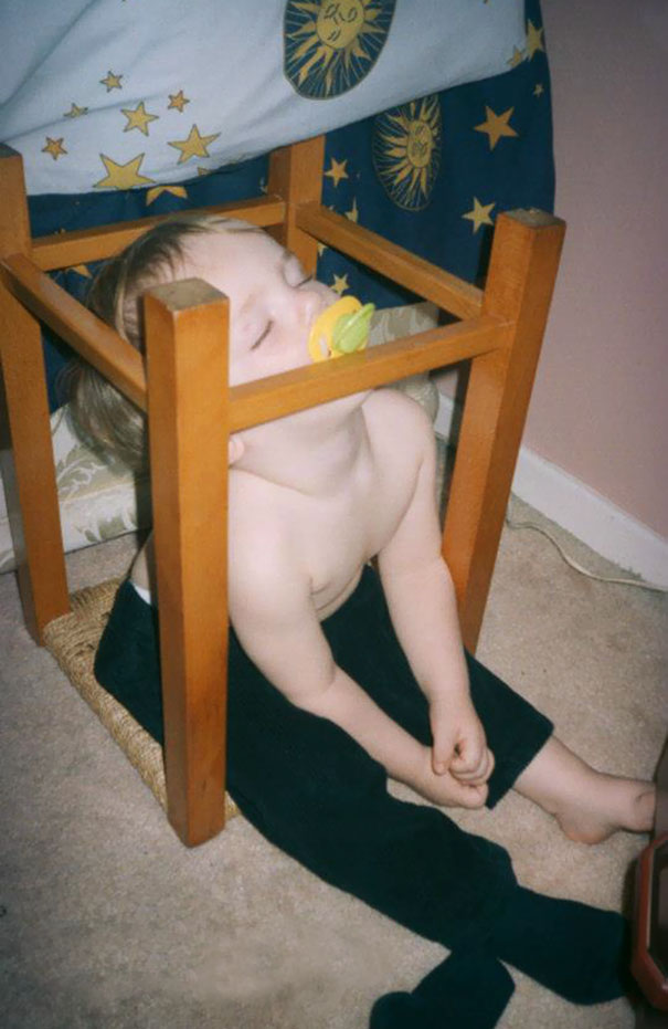 15+ Hilarious Pics That Prove Kids Can Sleep Anywhere - Napping On The Upside Down Chair