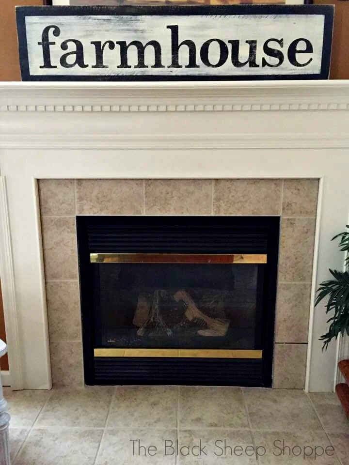 Farmhouse sign temporarily above fireplace.