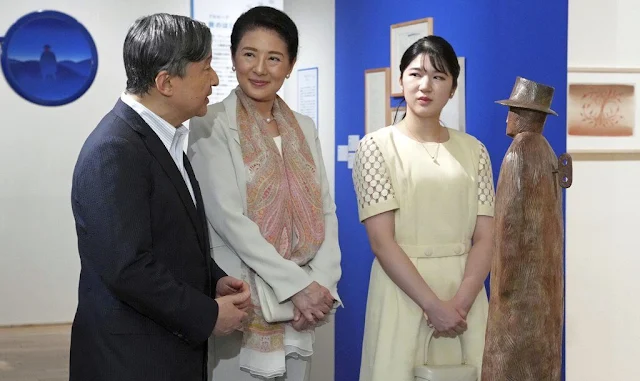 Empress Masako wore an off-white blazer suit and printed scarf, Princess Aiko wore a light yellow dress