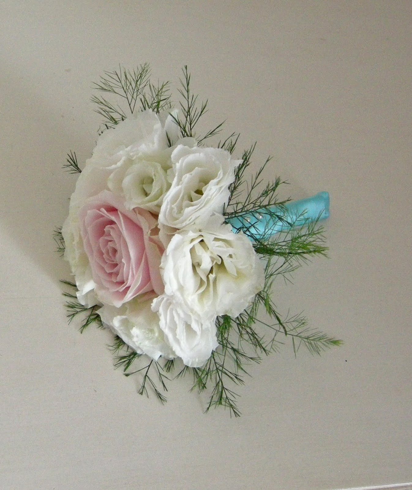 wedding bouquets tied with antique brooch