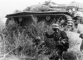 German infantry and a supporting StuG III assault gun during the advance towards Stalingrad, September 1942