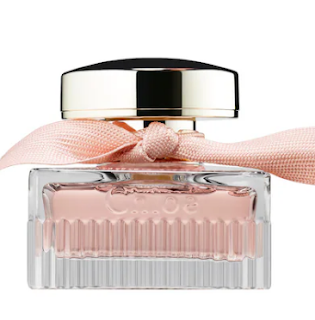 Chloé 'L'Eau' perfume bottle, characterized by its elegant and minimalist design with a light pink fragrance.