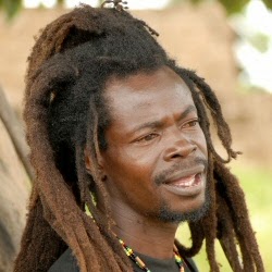 An African man with dreadlocks.