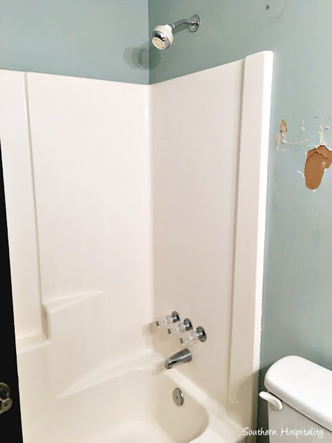 Tearing out bathtub with surround