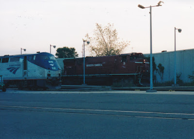 Minnesota Commercial M420W #35 & Amtrak P42DC #80 at Midway Station in St. Paul, Minnesota, on September 6, 2003