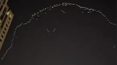 This is a huge flock of Canadian Geese not a UFO fleet.