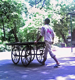 hand-cart with man pushing