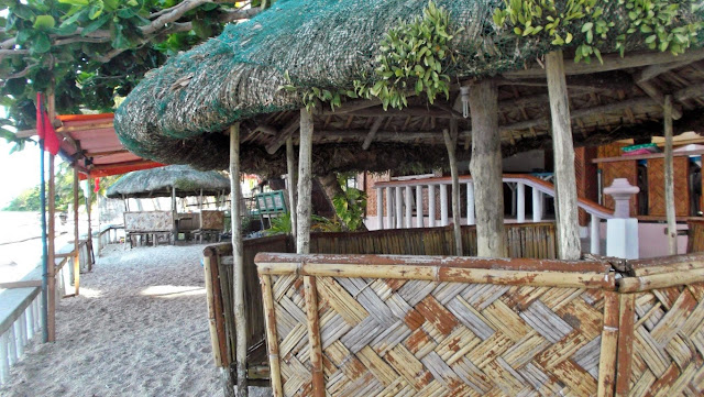 day use cottages in the white sand of Francisco Beach Resort and Lodge at San Antonio, Dalupiri Island, Northern Samar