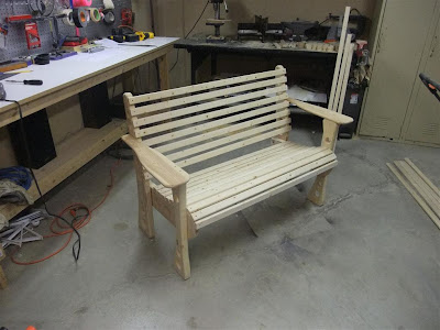 assembled wood bench, similar to adarondack chair