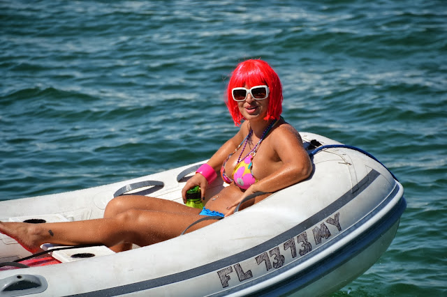 girl in wig on boat
