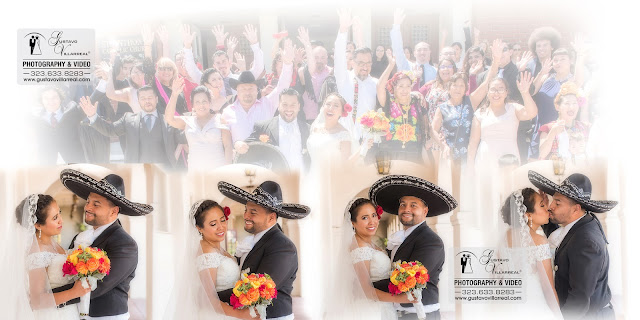 alt="bride and charro groom posing for the photo with all family and guest in front of the church">
