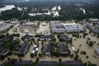 Hurricane Harvey's flooding of Houston, with 50 inches of rain in some places, contributed to 2017's record losses from climate and weather disasters, NOAA reports. (Credit: Win McNamee/Getty Images) Click to Enlarge.