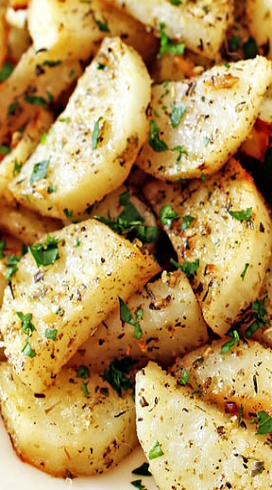 Roasted potatoes smothered in olive oil, garlic, Italian seasonings and Parmesan cheese plus the always optional red pepper flakes for those of you who like a spicy kick.