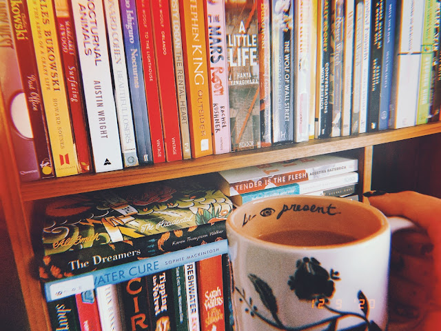 Book shelf with a cup of tea