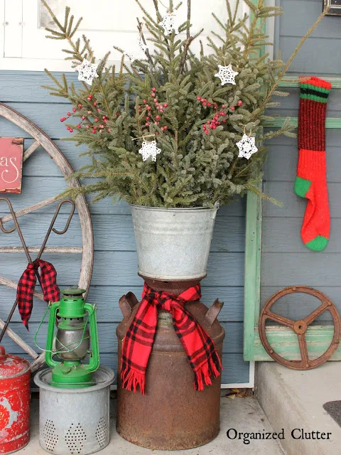 Covered Patio Outdoor Greenery Buckets #rusticChristmas #sprucetops