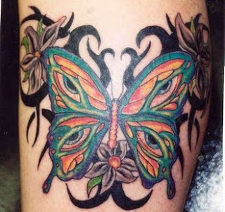 Butterfly and Tribal Design Tattoo