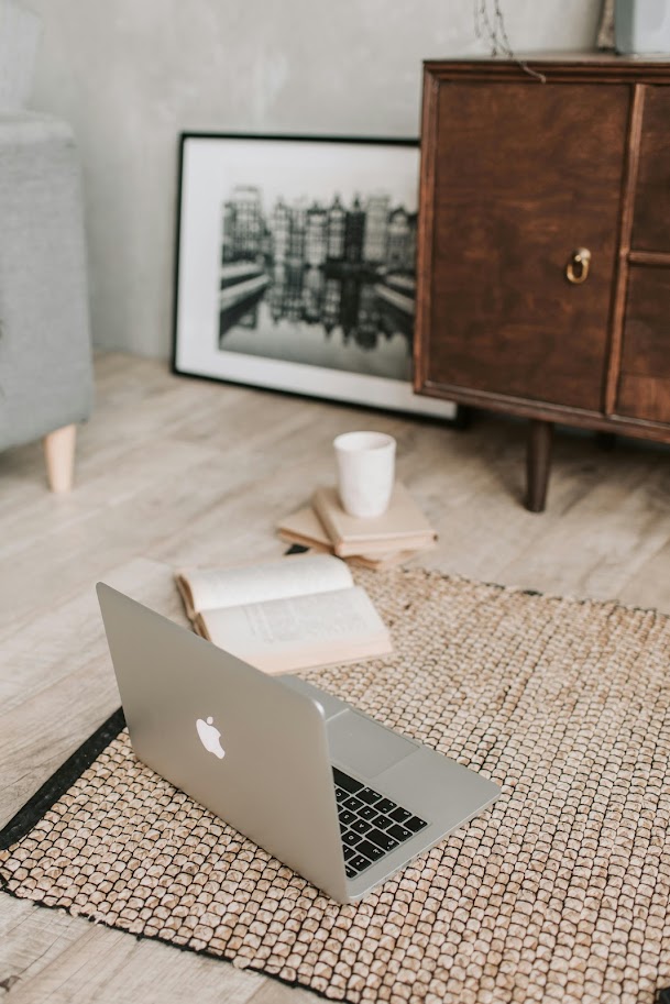 laptop-and-books-on-floor-carpet-online-courses