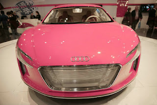 pink audi car in the show room