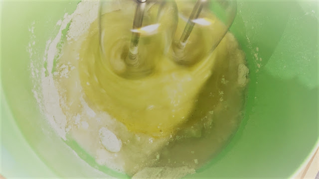 A whisk mixing the ingredients