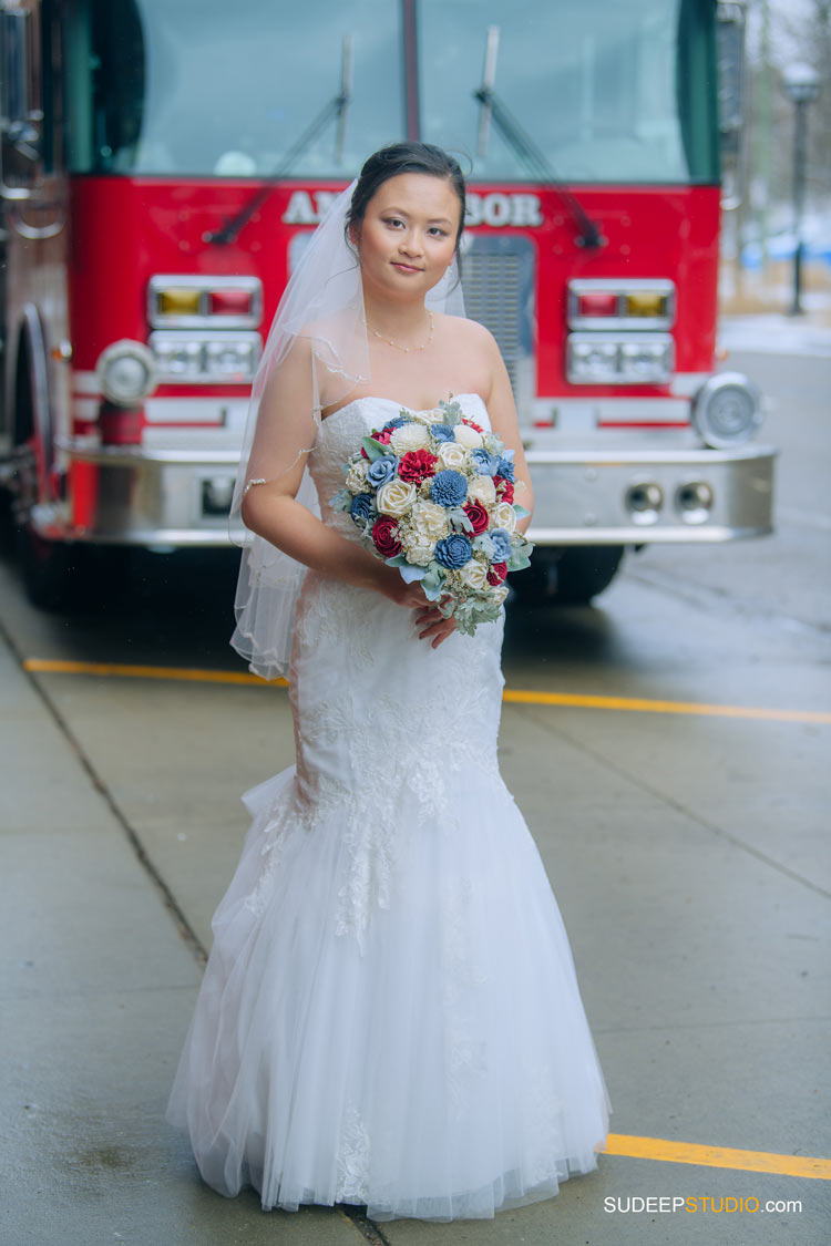 Ann Arbor Wedding Portrait Photography in front of Firehouse Fire truck by SudeepStudio.com Michigan Wedding Photographer
