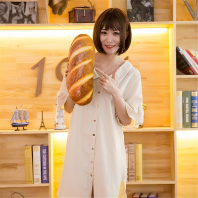 This Unique Pillow Shaped Like A Giant Loaf Of Bread, Perfect For Carbohydrate Lovers