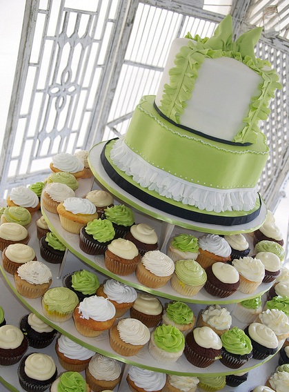 An apple green and white two tier wedding cake 120 cupcakes and stand for a