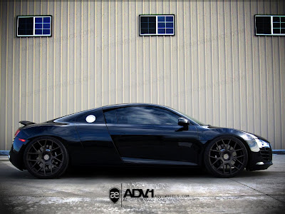 a blacked-out Audi R8 that a blacked-out Audi R8 that