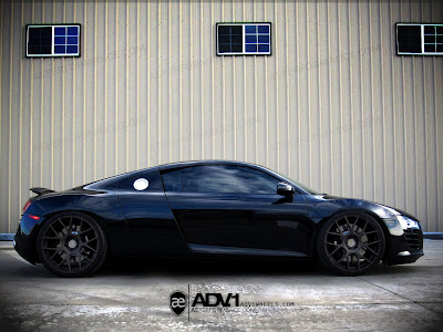 a blacked-out Audi R8 that