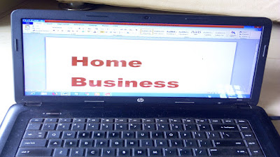 Home business projected out of a computer screen.