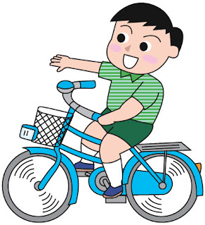 自転車に乗っている子供