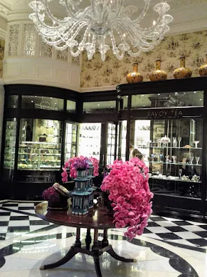 Interior of the Savoy Hotel in London: Table with pink flowers