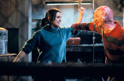 Movie scene from Freddy's Dead: The Final Nightmare featuring Robert Englund as Freddy Kruger trying to kill his daughter Maggie, played by Lisa Zane