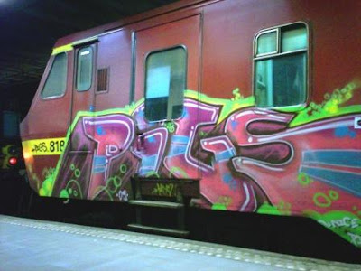 train graffiti with pigs