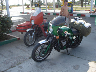 Elvis Cafe Racer Beside Ukrainian Relic with Sidecar