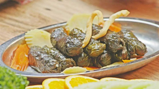 Vegetarian vine leaves in a serving dish