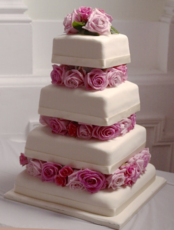 Wedding Cakes With Roses Between Tiers