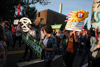 Demonstrations in Washington today. (Credit: Mandel Ngan/Agence France-Presse — Getty Images) Click to Enlarge.