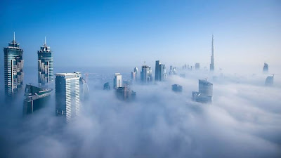 Dubai-based German photographer Sebastian Opitz captures the surreal and mystical look of his adopted city as fog rolls in and out at sunrise. The photographer renames the cityscape as Cloud City for the brief moments when the mist takes over and fills the empty space between the towering buildings. Optiz's images offer a serene and dreamy view of a bustling city, re-imagining it as a heavenly metropolis in the sky.