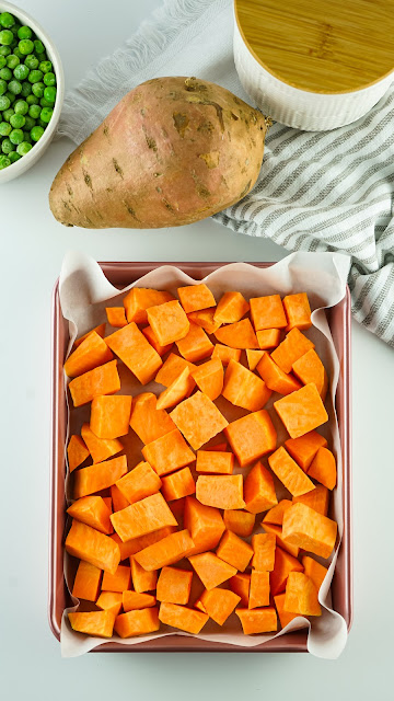 sweet potatoes on a baking pan.