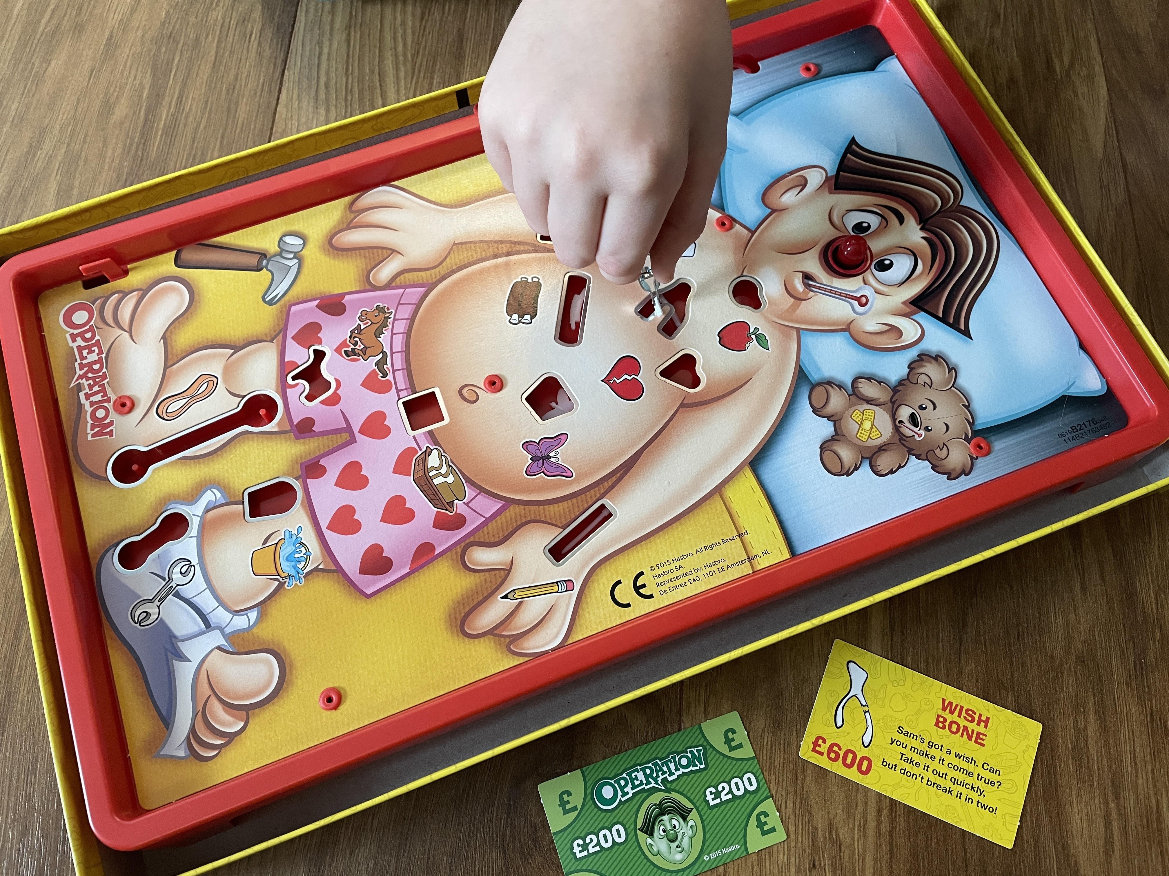 boy playing the operation game