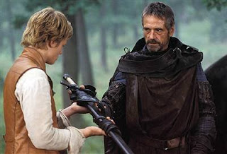 Luke receives his father's light sabre from Obi-Wan Kenobi